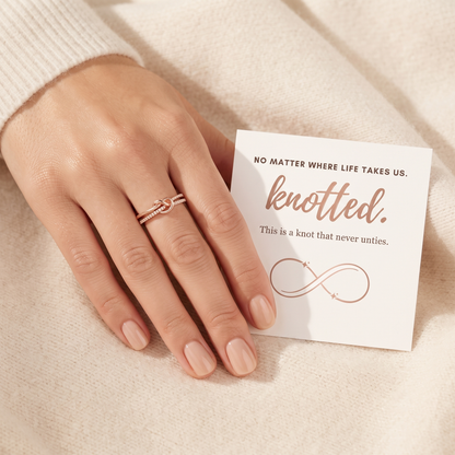 Infinity Knot Ring worn on hand - Kynd Co.