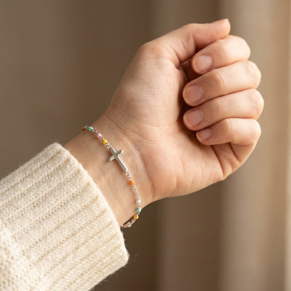 Cross Bracelet shown on wrist - Kynd Co.