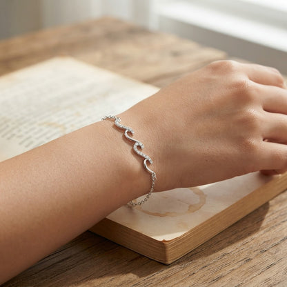 Wave Bracelet shown on wrist - Kynd Co.