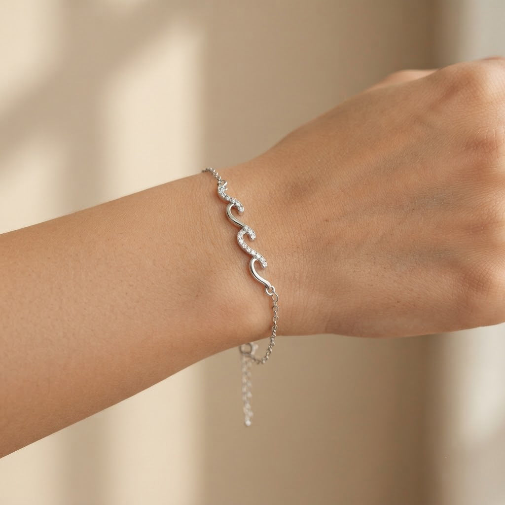 Wave Bracelet shown on wrist - Kynd Co.