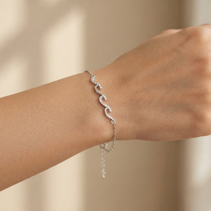 Wave Bracelet shown on wrist - Kynd Co.