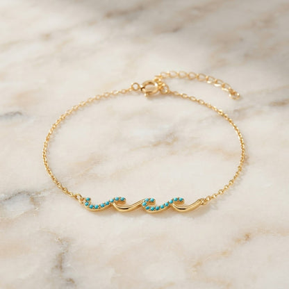 Wave Bracelet shown on wrist - Kynd Co.