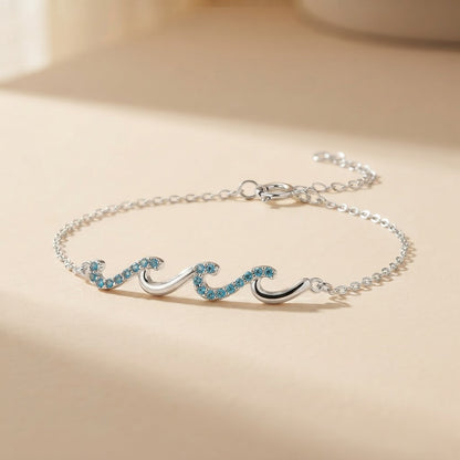 Wave Bracelet shown on wrist - Kynd Co.